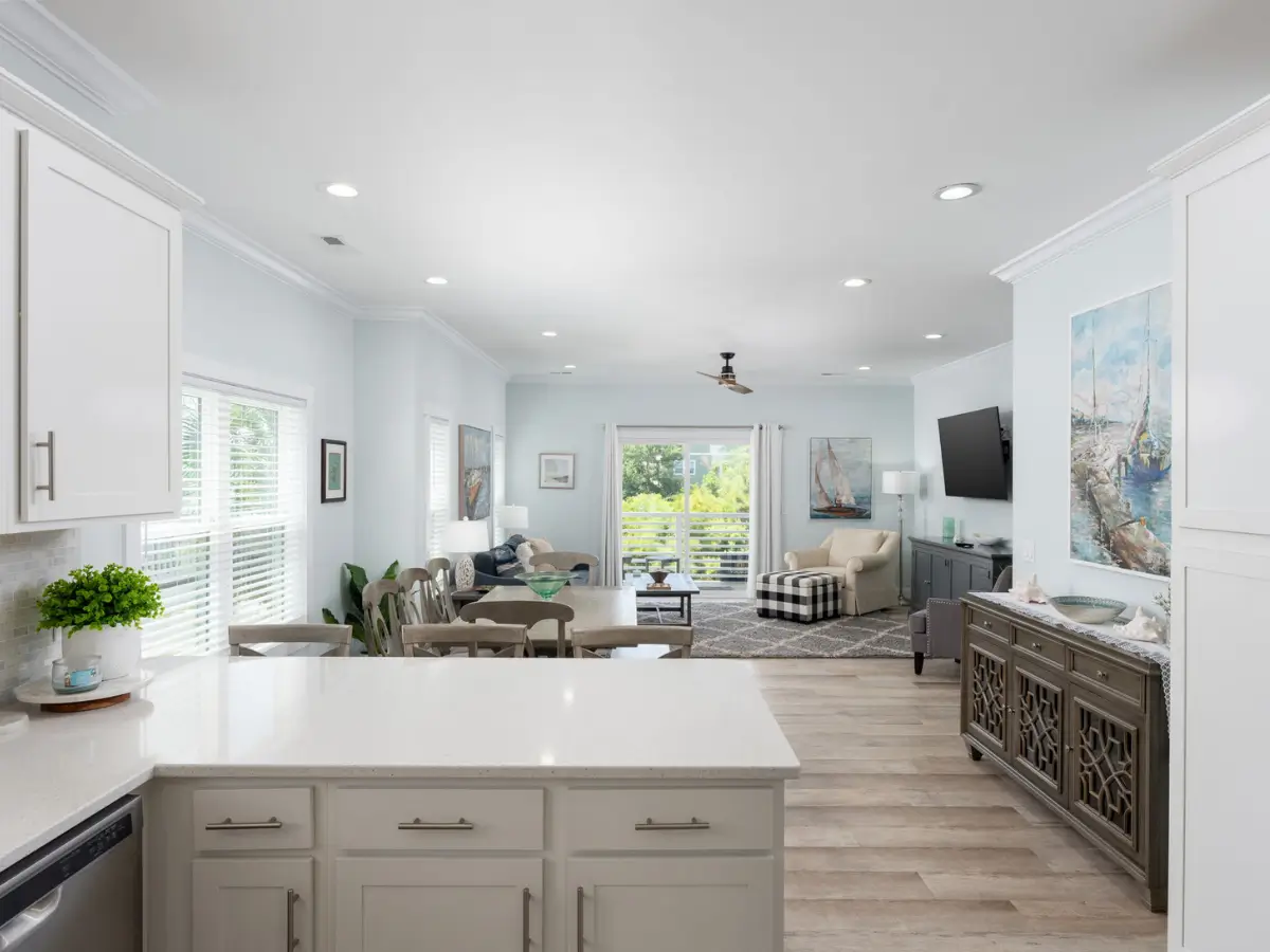 Spacious open-concept kitchen overlooking the dining and living areas at A Sail Away beach rental.