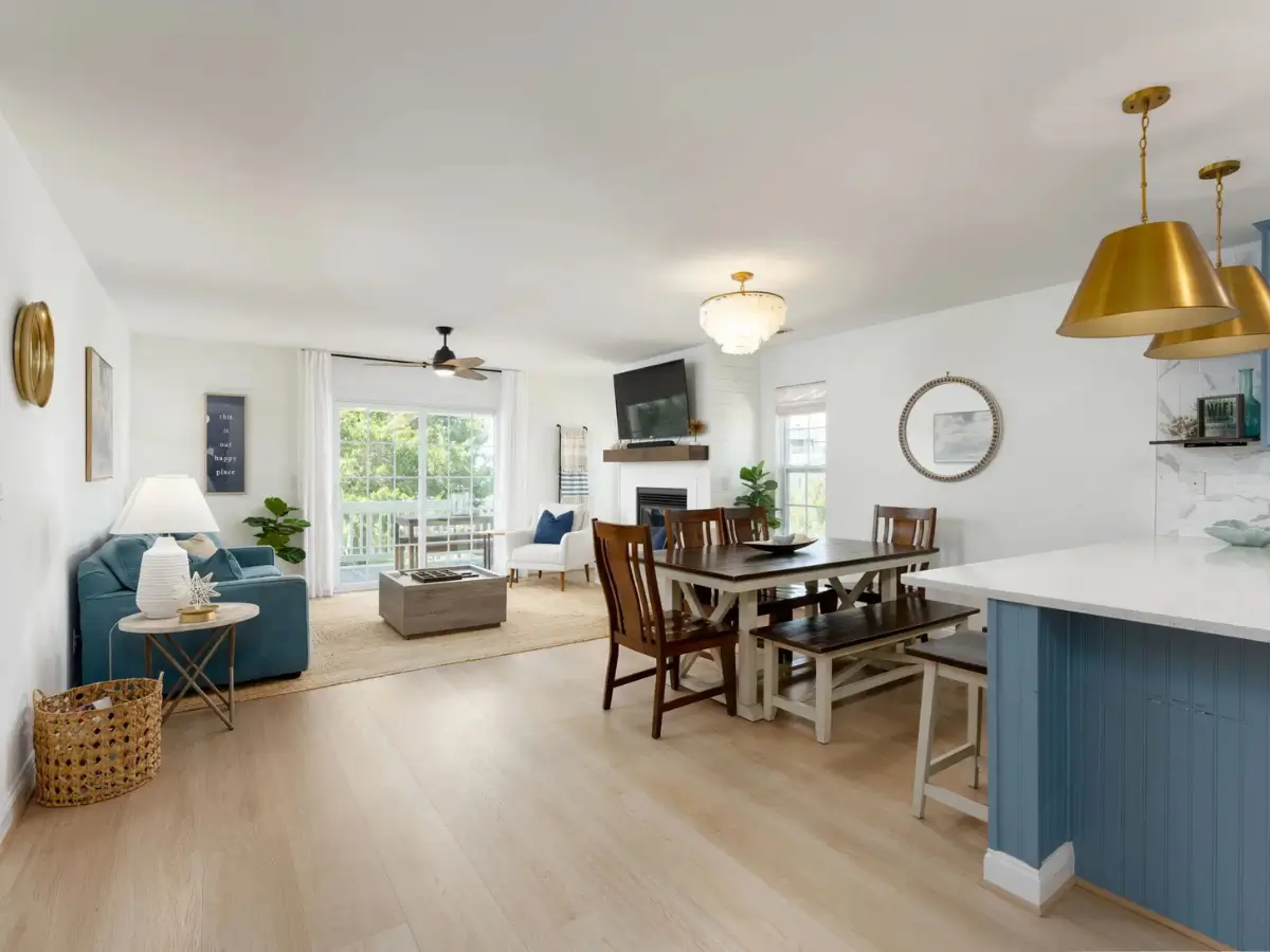 Open-concept kitchen, dining, and living room designed for family gatherings at Salty Dream.
