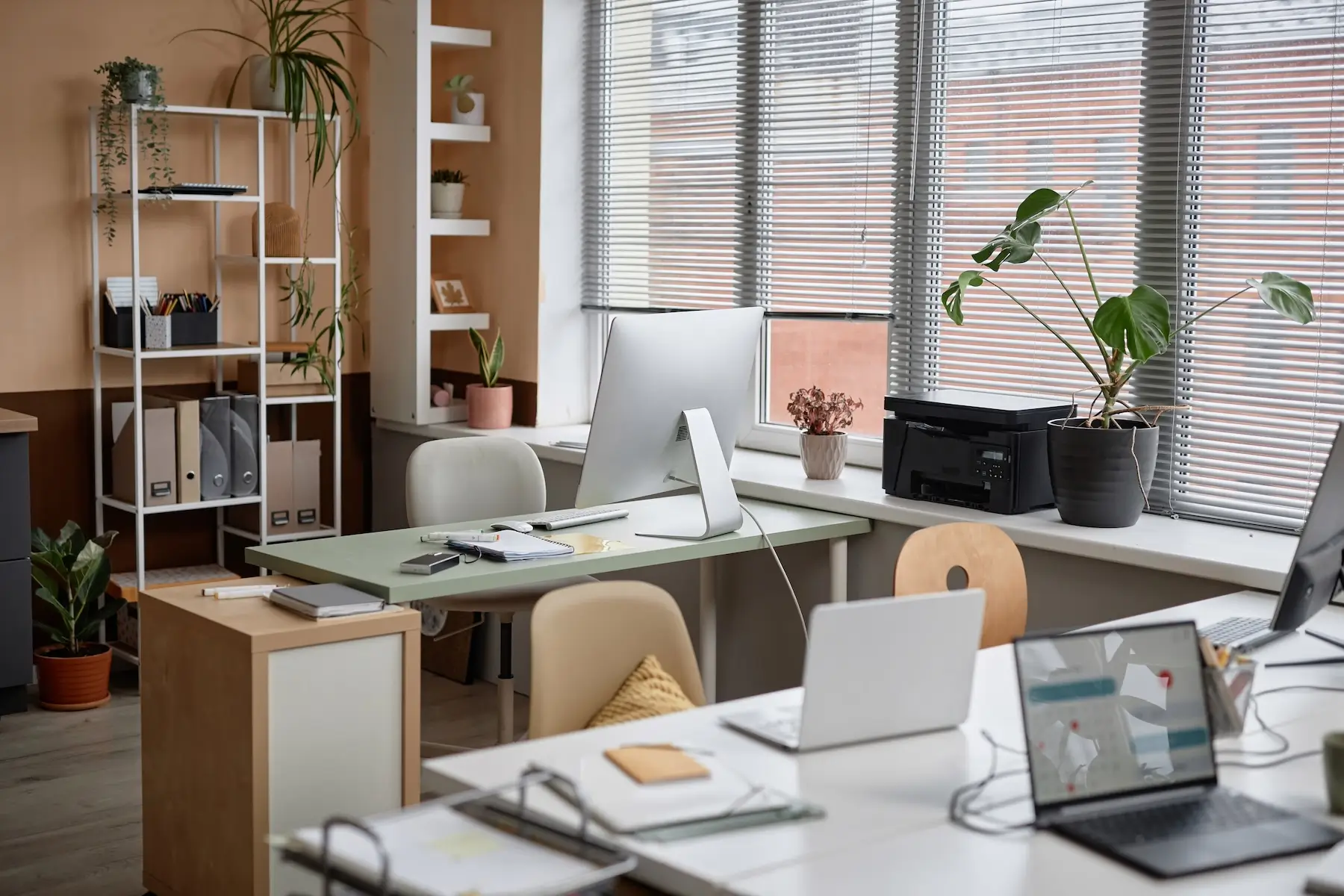 Home office workspace for managing rental properties and communicating with property owners.