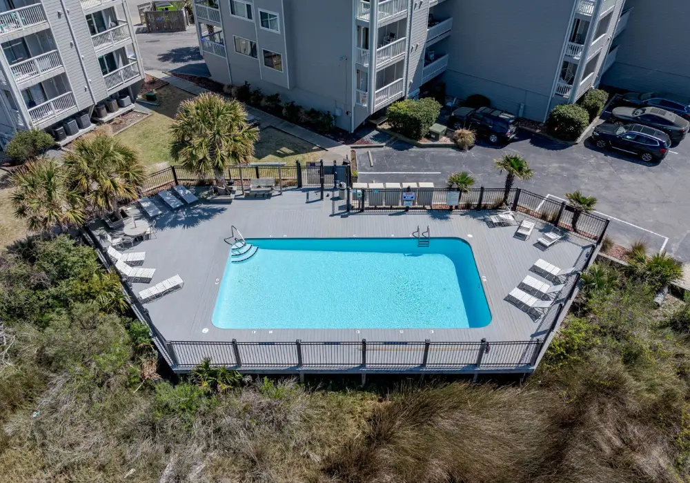 Community swimming pool available to guests at The Sunshine Shack