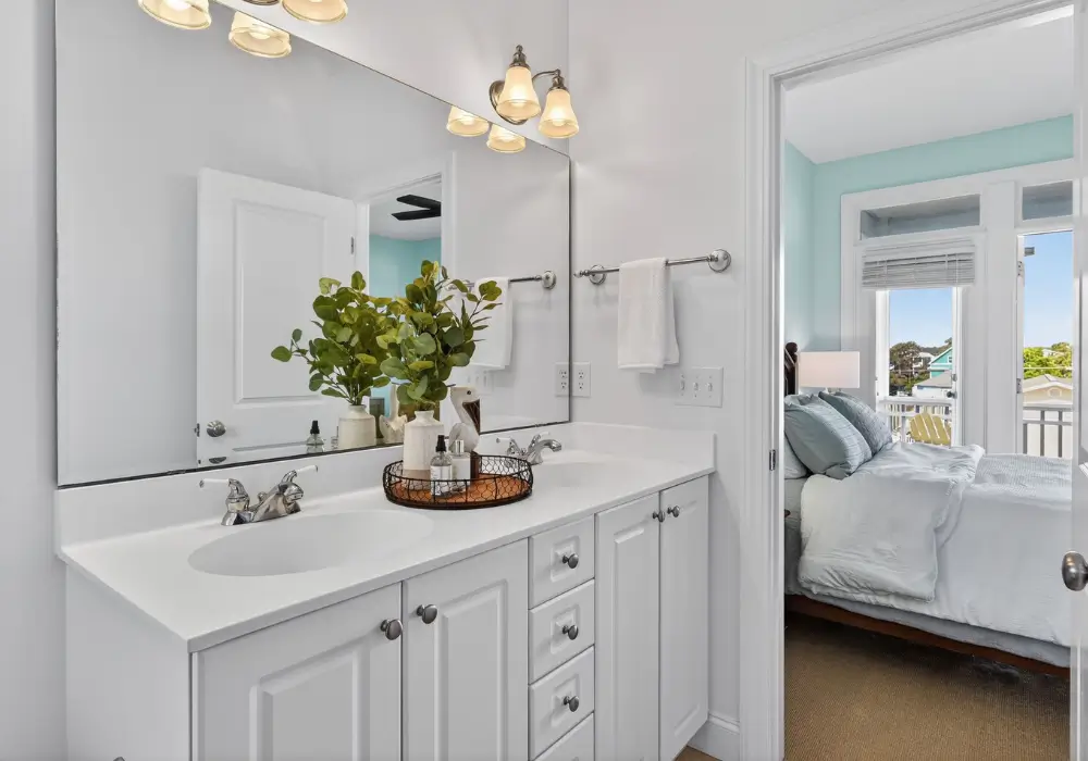 Full bathroom with double vanity and shower at Tuna Luna