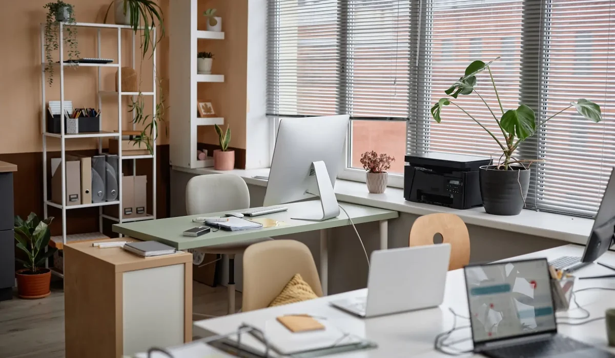 Home office workspace for managing rental properties and communicating with property owners.