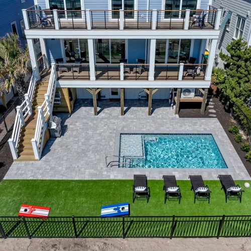 Aerial view of The Pearl’s private pool and direct beach access in Kure Beach
